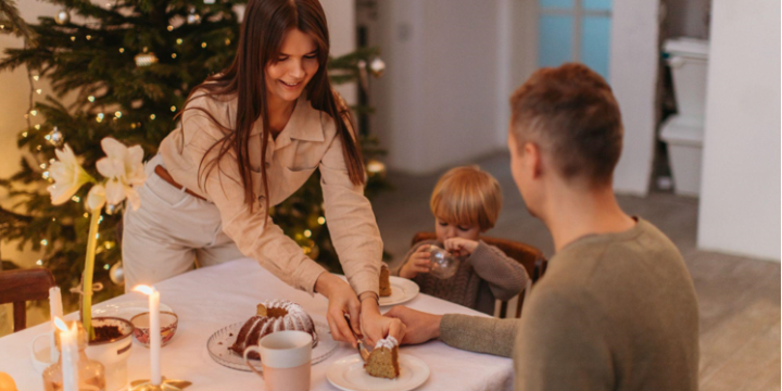 Adding Festive Cheer to Your Company Dinner with a Christmas Tree with Lights and Star Topper