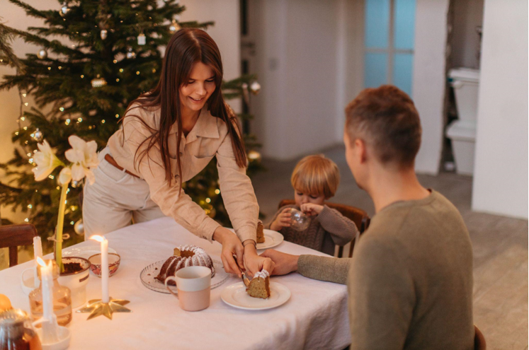 Adding Festive Cheer to Your Company Dinner with a Christmas Tree with Lights and Star Topper